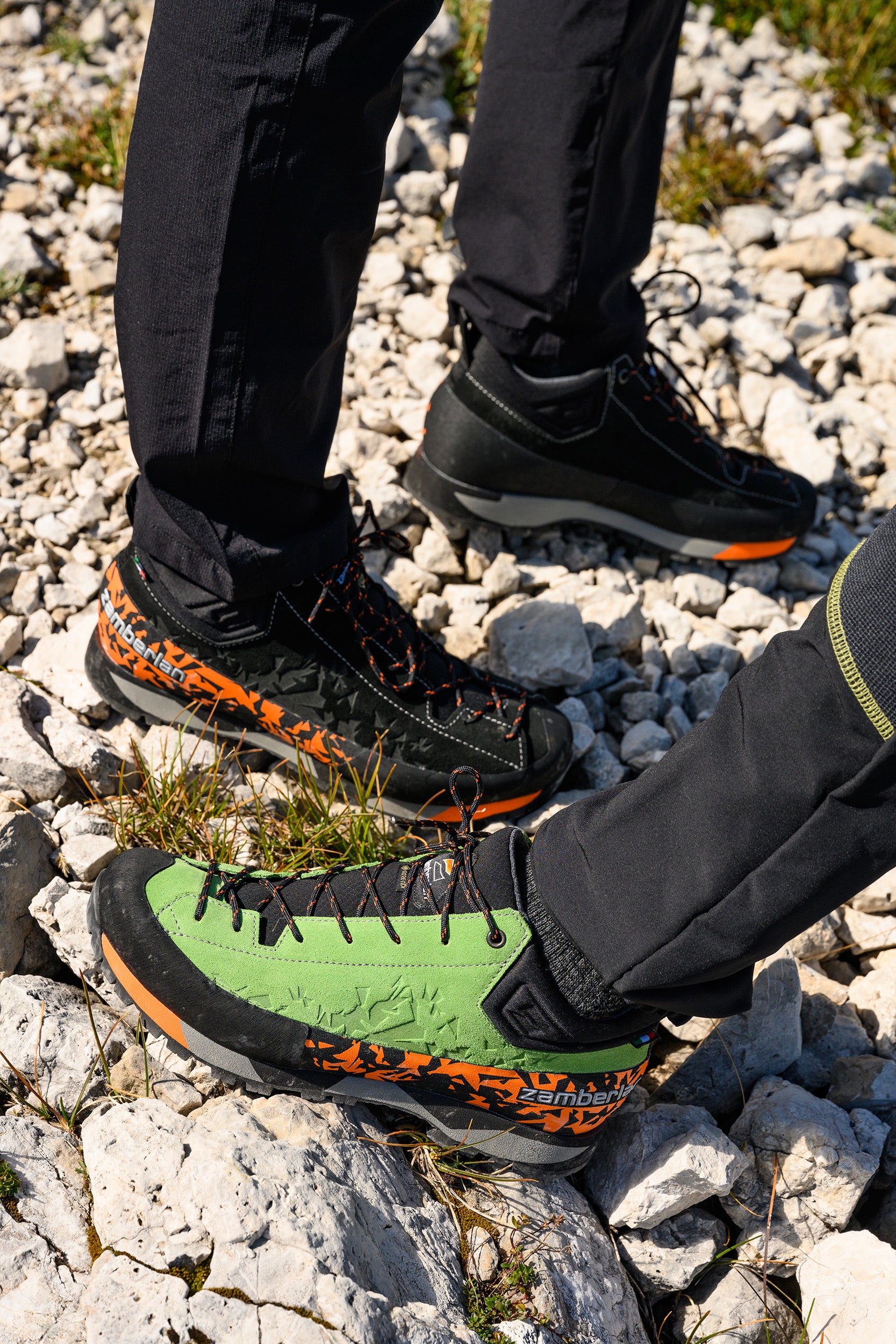 Photo of two people standing on rocky ground wearing Salathe GTX boots. 