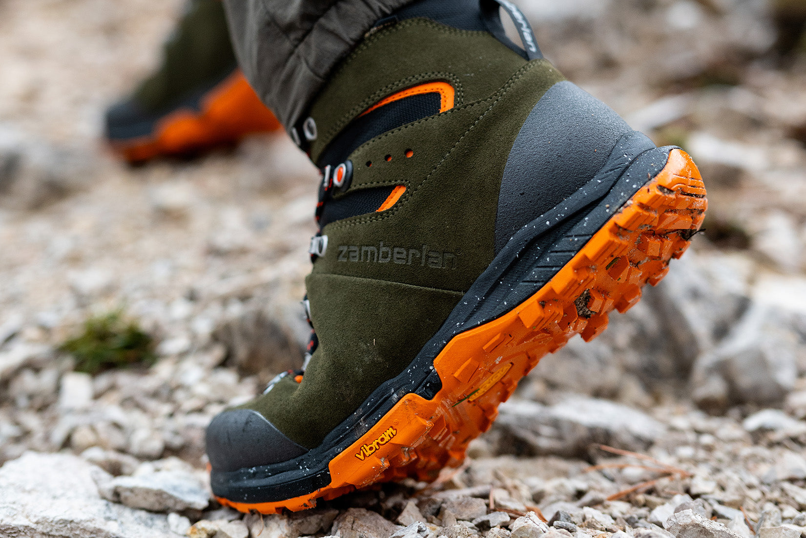A close up image of the Zamberlan Thunder Pro GTX in Musk with orange outsole. 