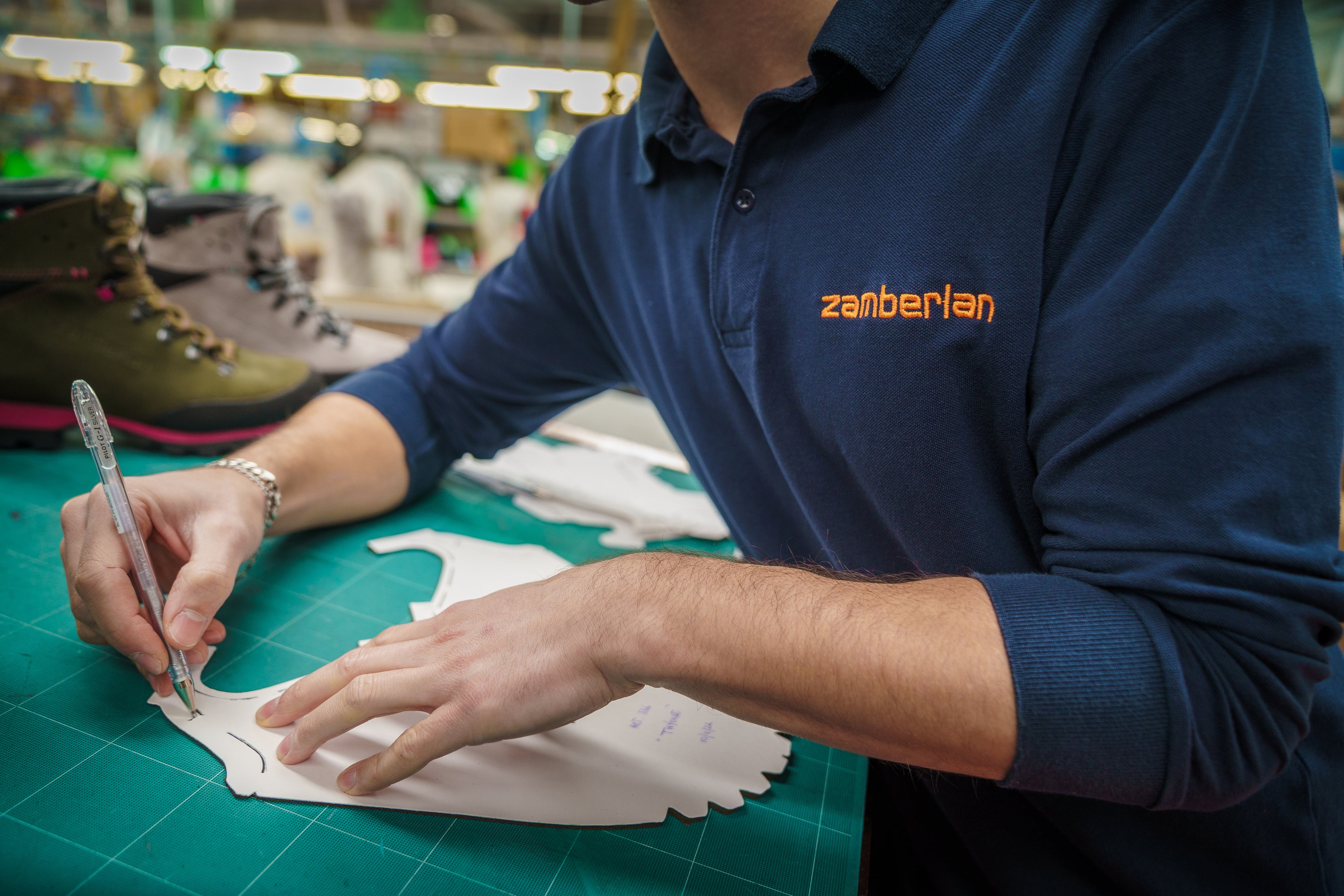 Zamberlan employee designing boot pattern.