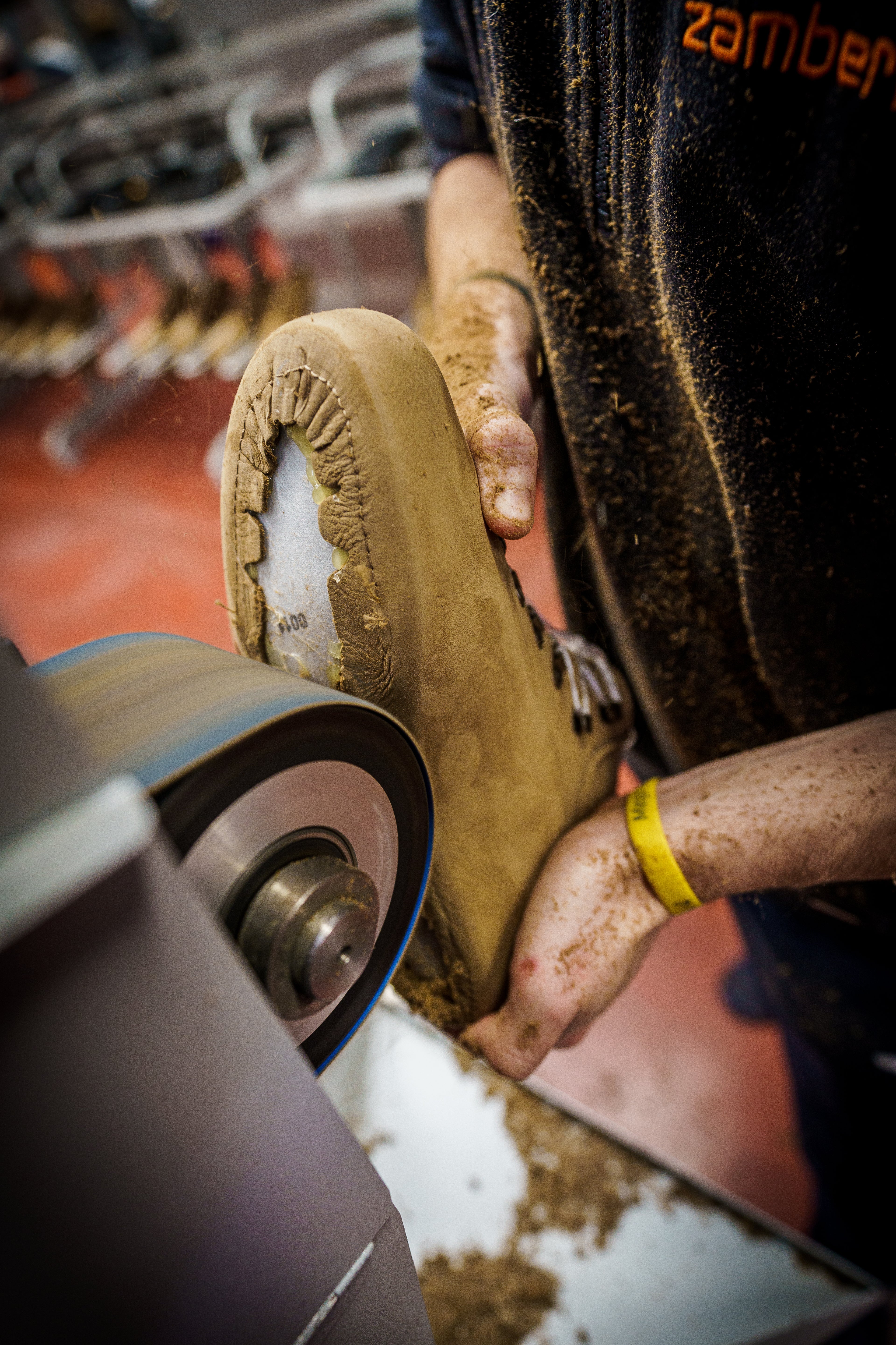 Zamberlan employee handcrafting hiking boots in the factory. 